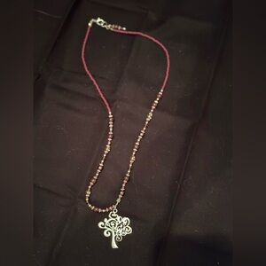 Elegant Silver Pendant Necklace with Red Beads